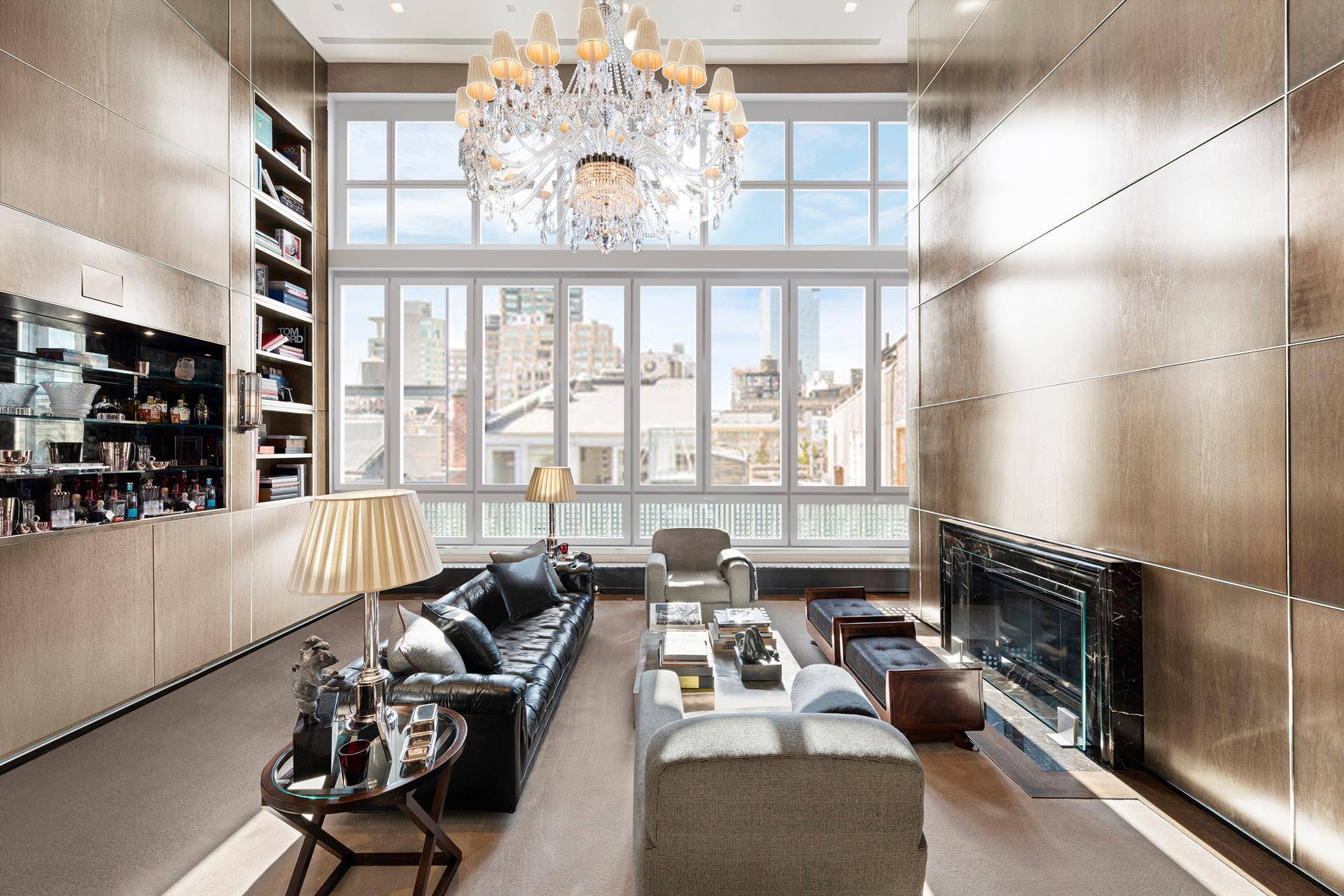 Prime triplex penthouse with a two story private roof deck situated on one of the most desired cobblestone streets in SoHo.