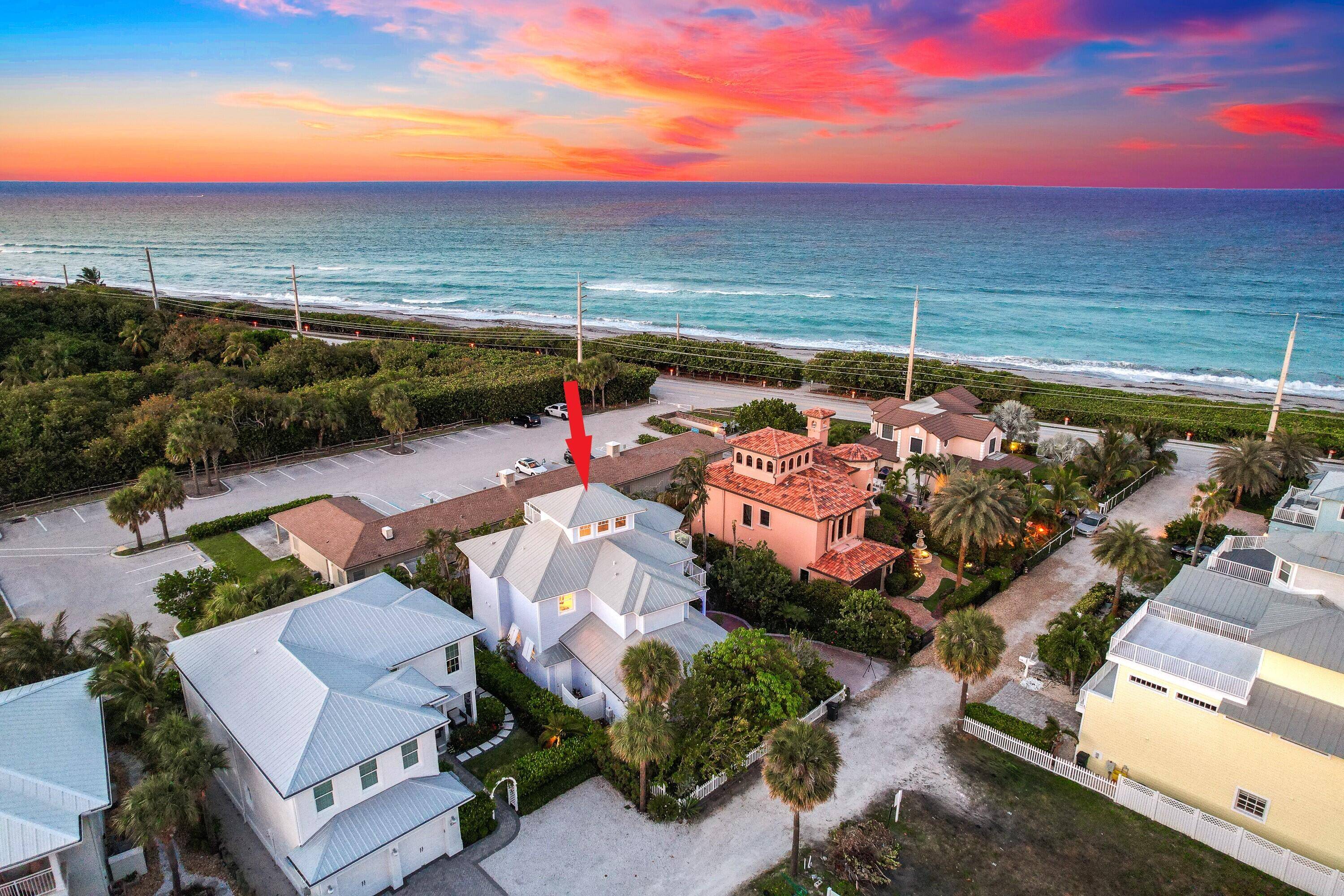 Enjoy breathtaking ocean views from this three story Key West style beach home, just steps from the sand in Juno Beach !