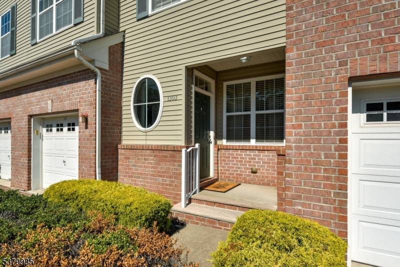 Nestled in a niche sidewalk community with a light, bright and flexible floor plan.