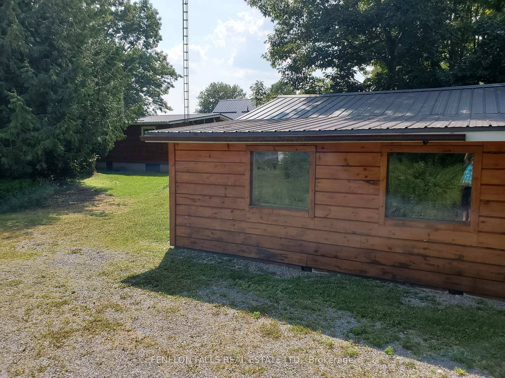 Four Season cottage near mouth of canal to Sturgeon Lake.