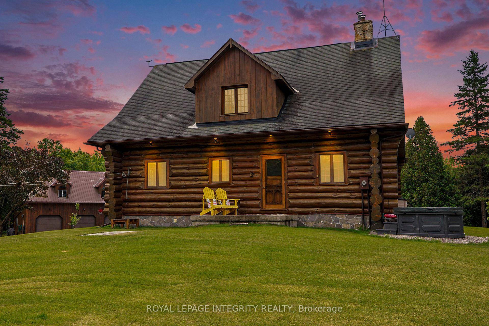 Escape to your own private retreat in this stunning custom built log home set on over 20 acres of beautifully fenced and gated land.