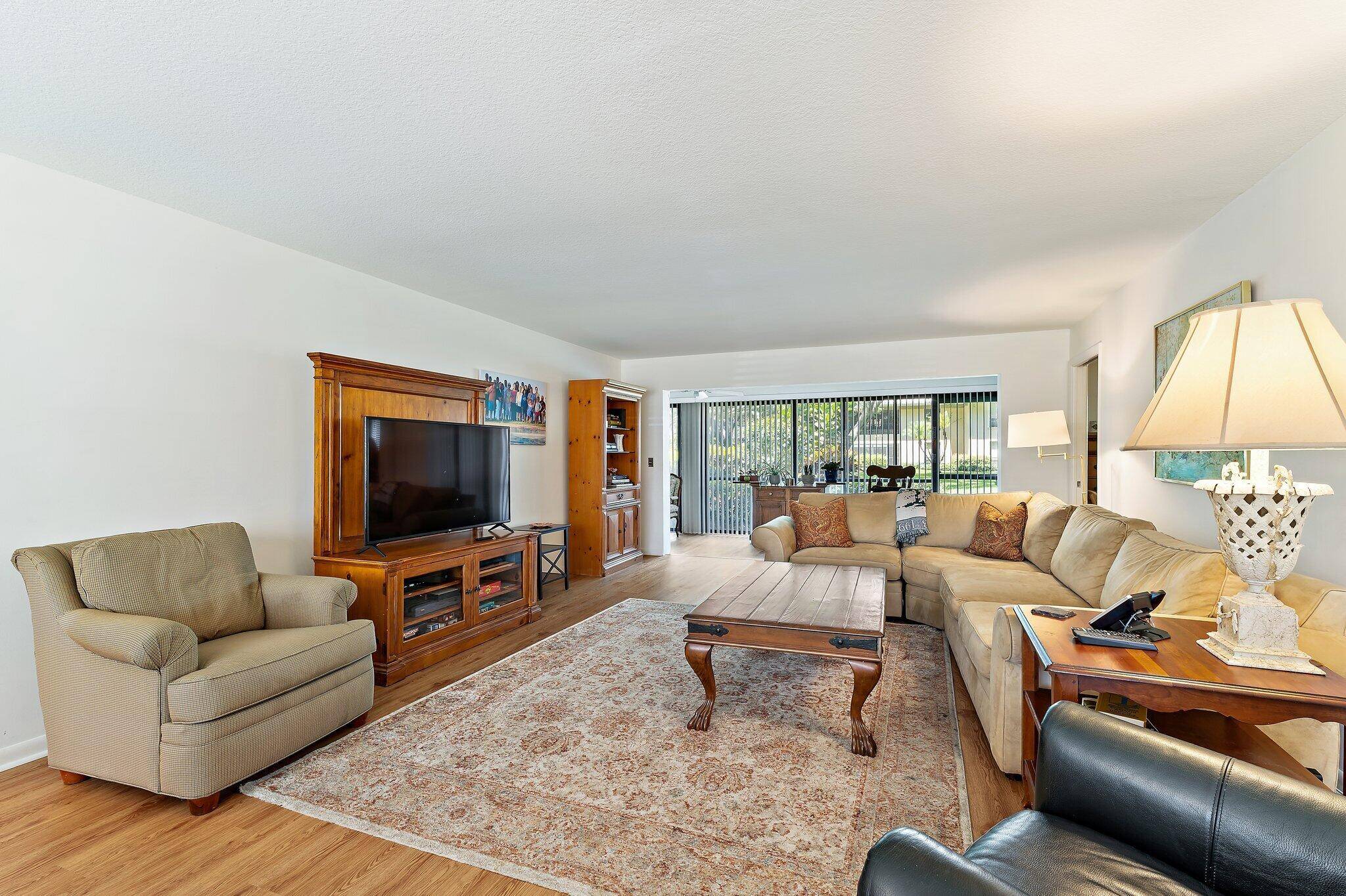 A beautifully maintained rarely available first floor condo offering 3 bedrooms, 2.