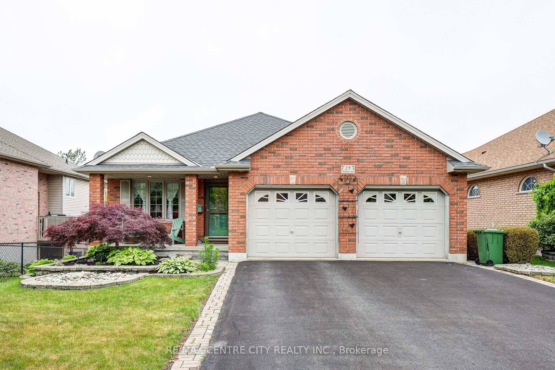 Stunning bungalow backing onto a pond and trails that run through prestigious Lake Margaret Estates.
