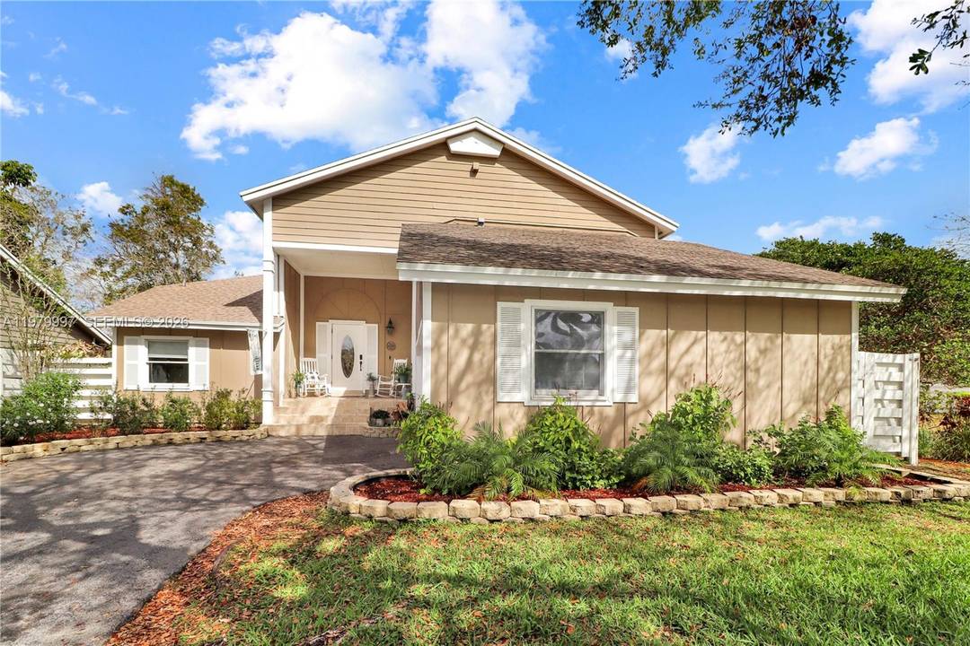 Welcome to your move in ready oasis in the heart of the sought after Country Walk community.