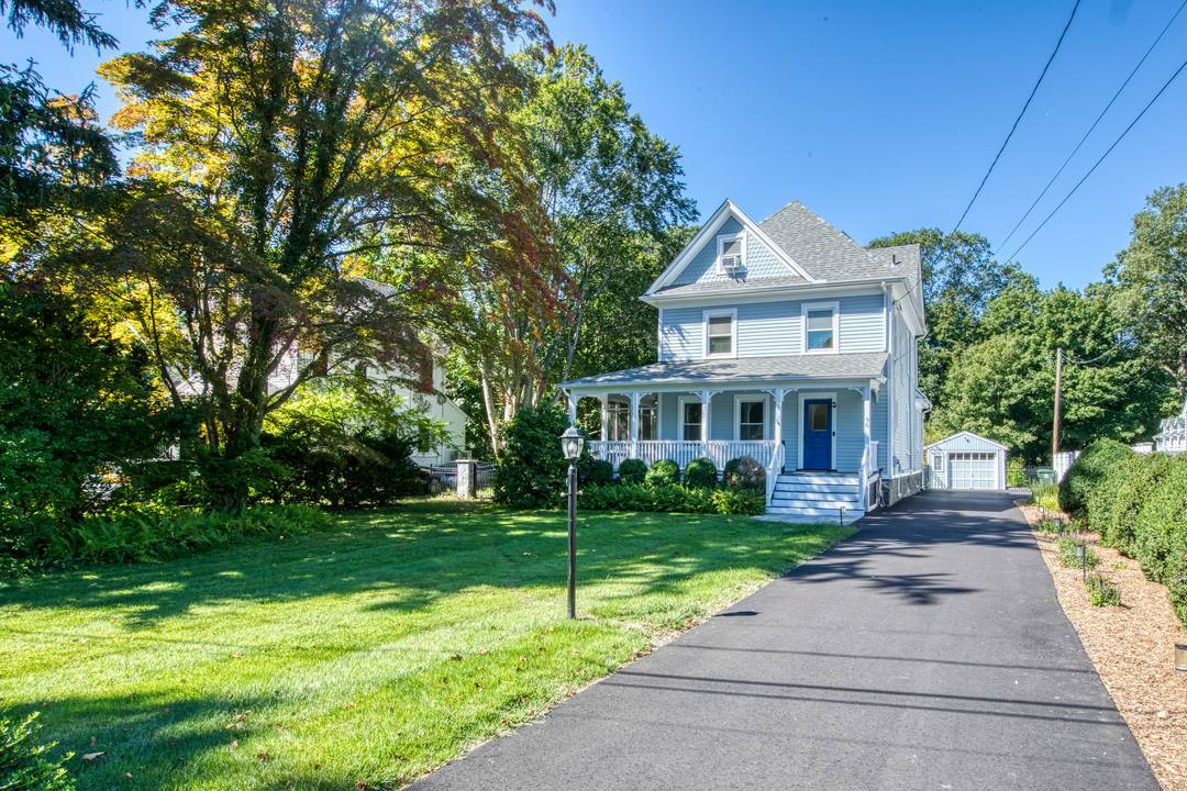 Welcome to 96 Holmes Avenue, a beautifully updated farmhouse that perfectly blends classic charm with modern amenities.