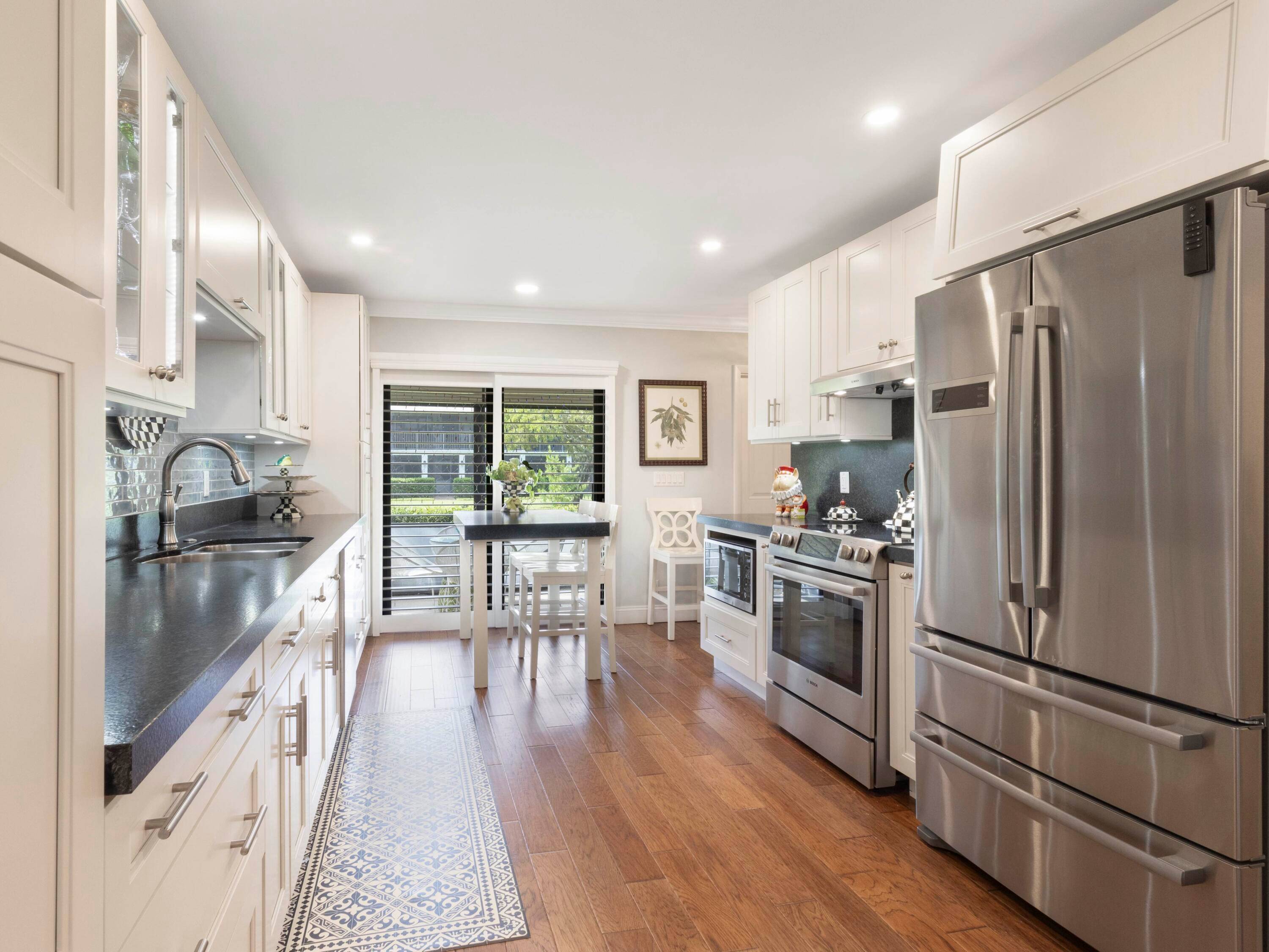This beautifully renovated design inspired 2 bed 2 bath condo just east of US 1 in Eastview Village Sq.