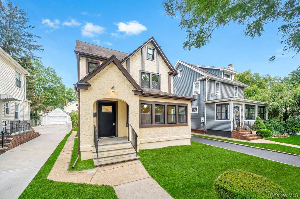 This stunning fully renovated 2025 Tudor in the Incorporated Village of Floral Park offers 5 bedrooms and 2.