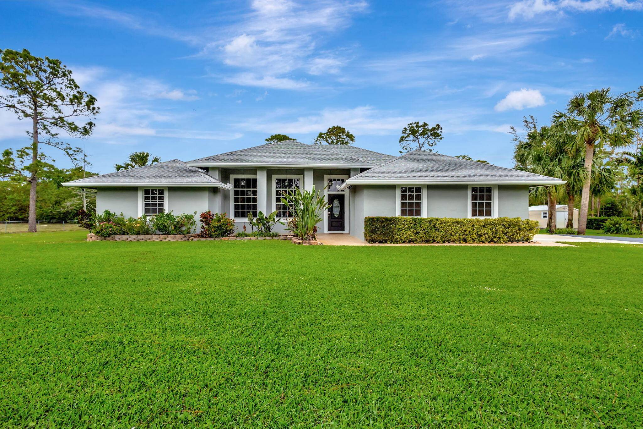 MOTIVATED SELLER ! Nestled on a sprawling 1.