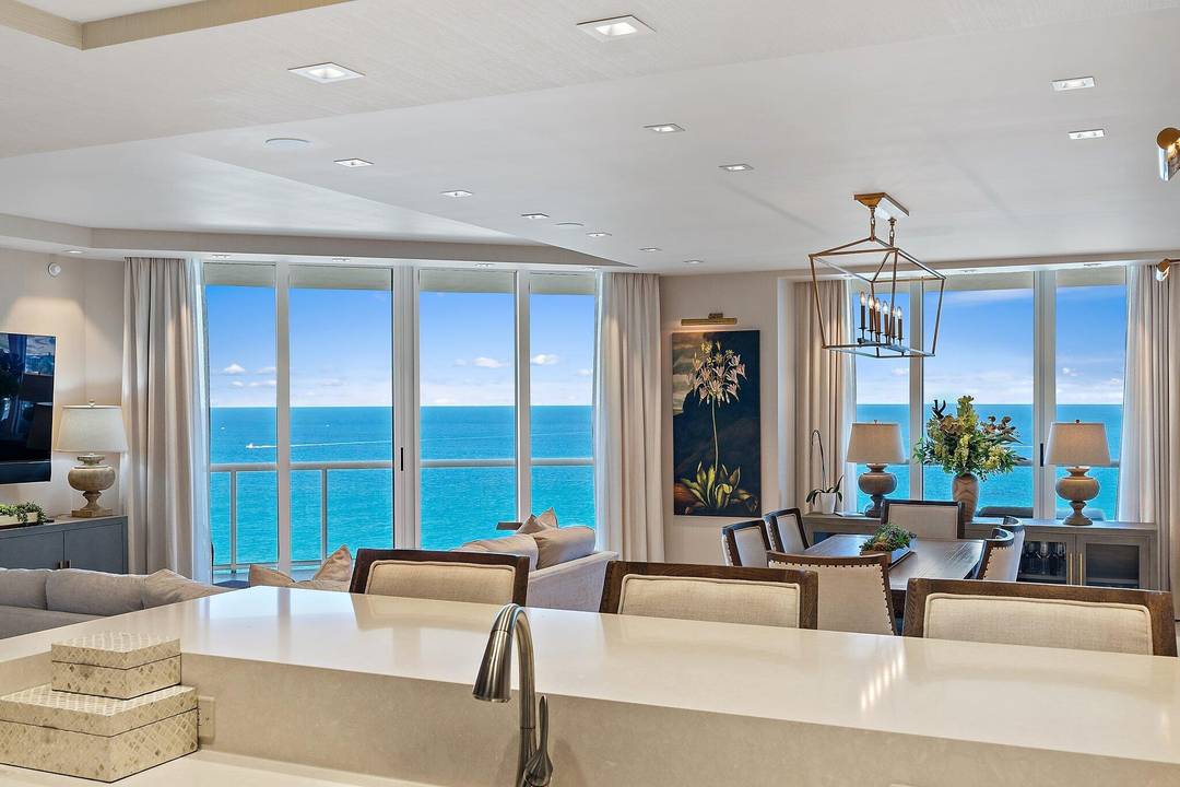 Enjoy island life with these breathtaking views from every room of this 23rd floor exclusive residence.