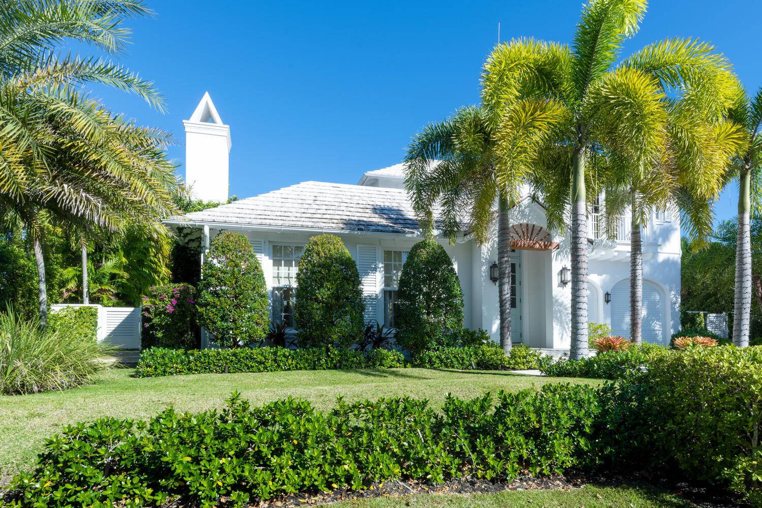 Discover Palm Beach living at its finest in this exquisite West Indies inspired residence boasting 4 bedrooms and 5.