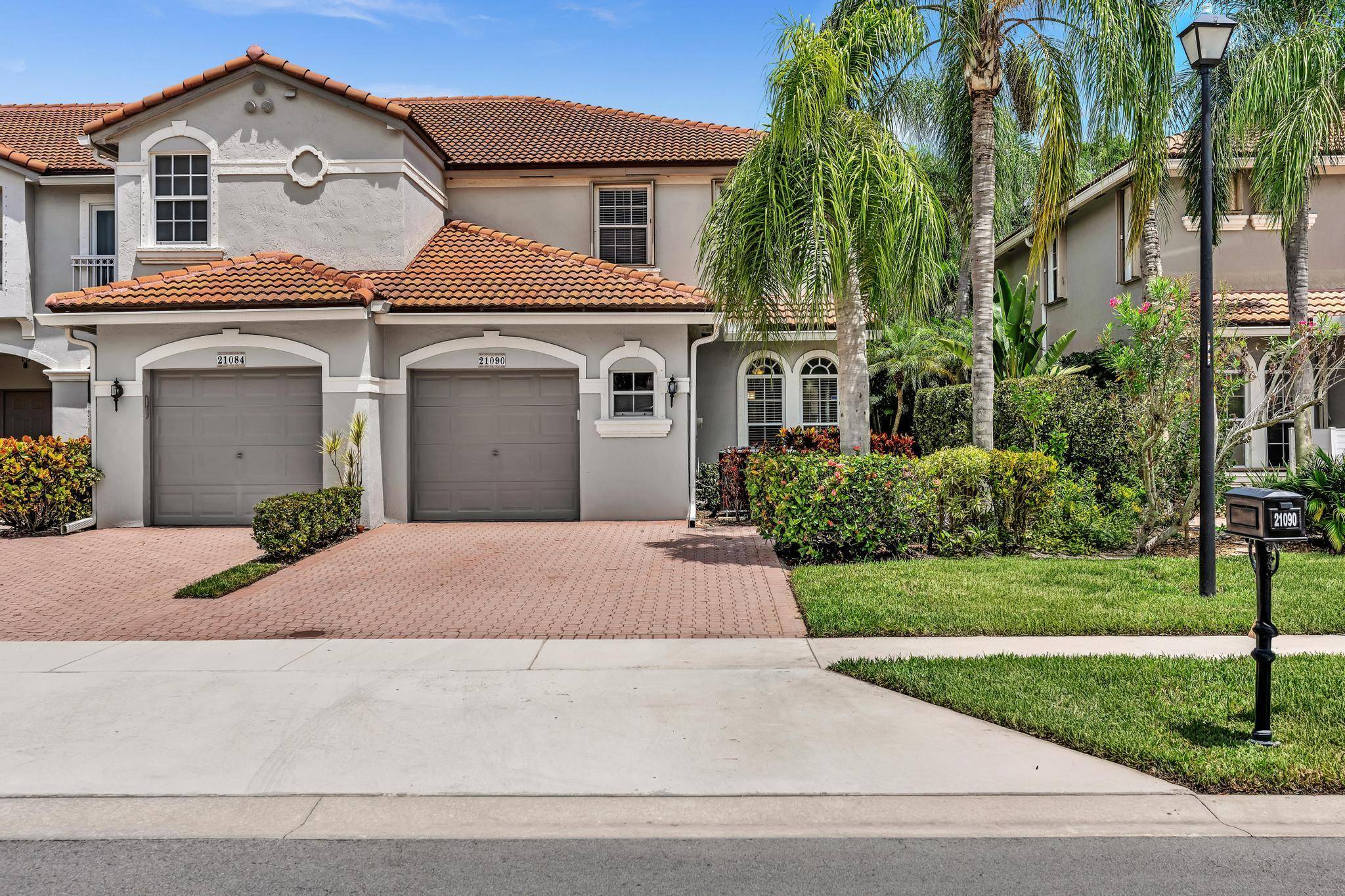 Largest and Rarely available 2 story corner unit in very desirable Mizner Pointe.