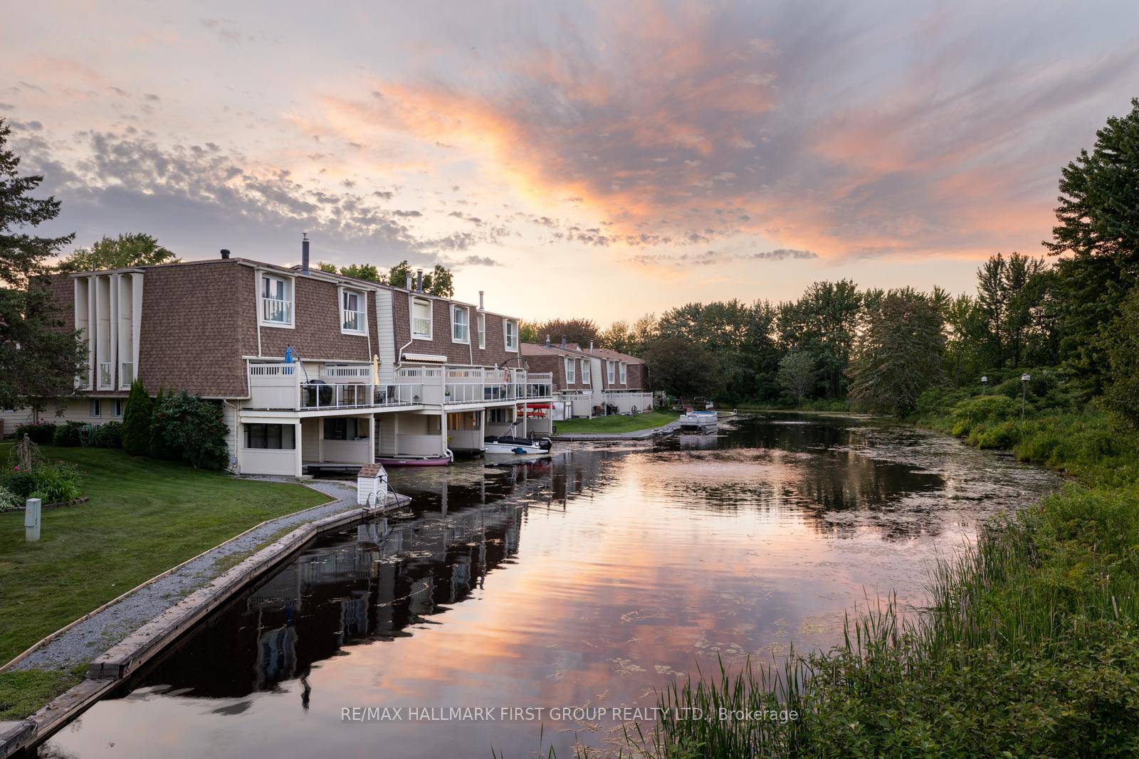 Discover your dream waterfront retreat w this stunning 3 storey townhome in the heart of Lagoon City, known as the Venice of Ontario a master waterfront community surrounded by mature ...