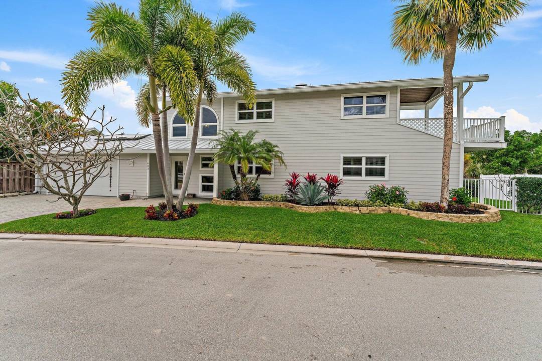 Nestled within the exclusive gated Jupiter Beach community of Xanadu by the Sea, this rare three bedroom plus den home sits on one of the most desirable lots in the ...