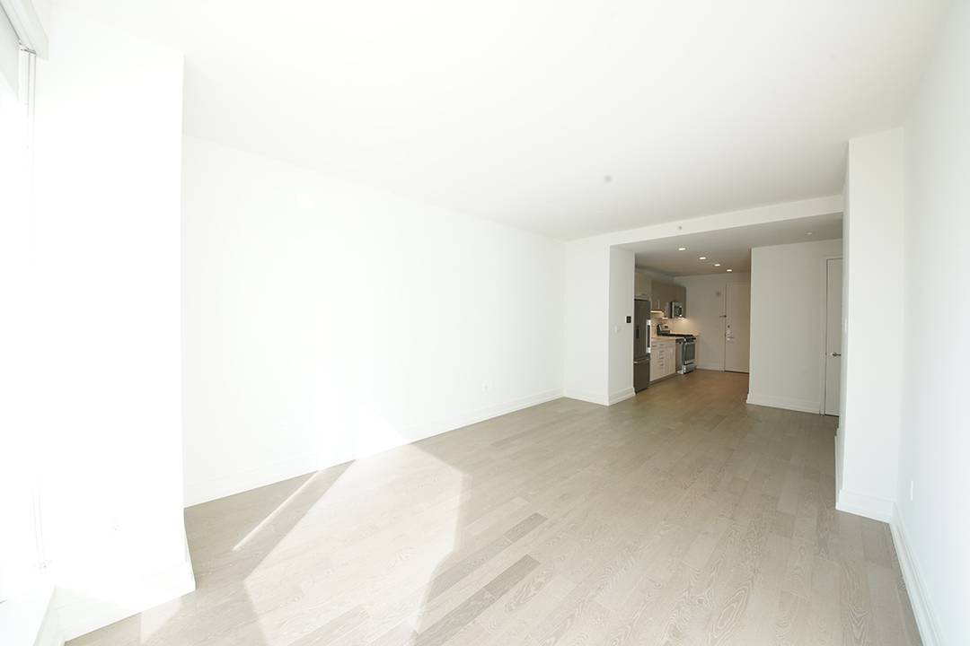 With sweeping views of the city from sunrise to sunset 555TEN towers over the new West Side.