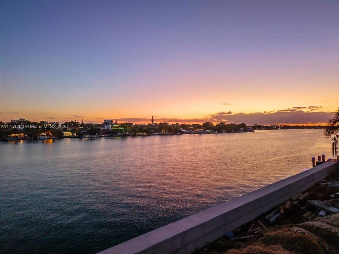 An extraordinary opportunity to create your dream waterfront estate in the exclusive Surfside community.