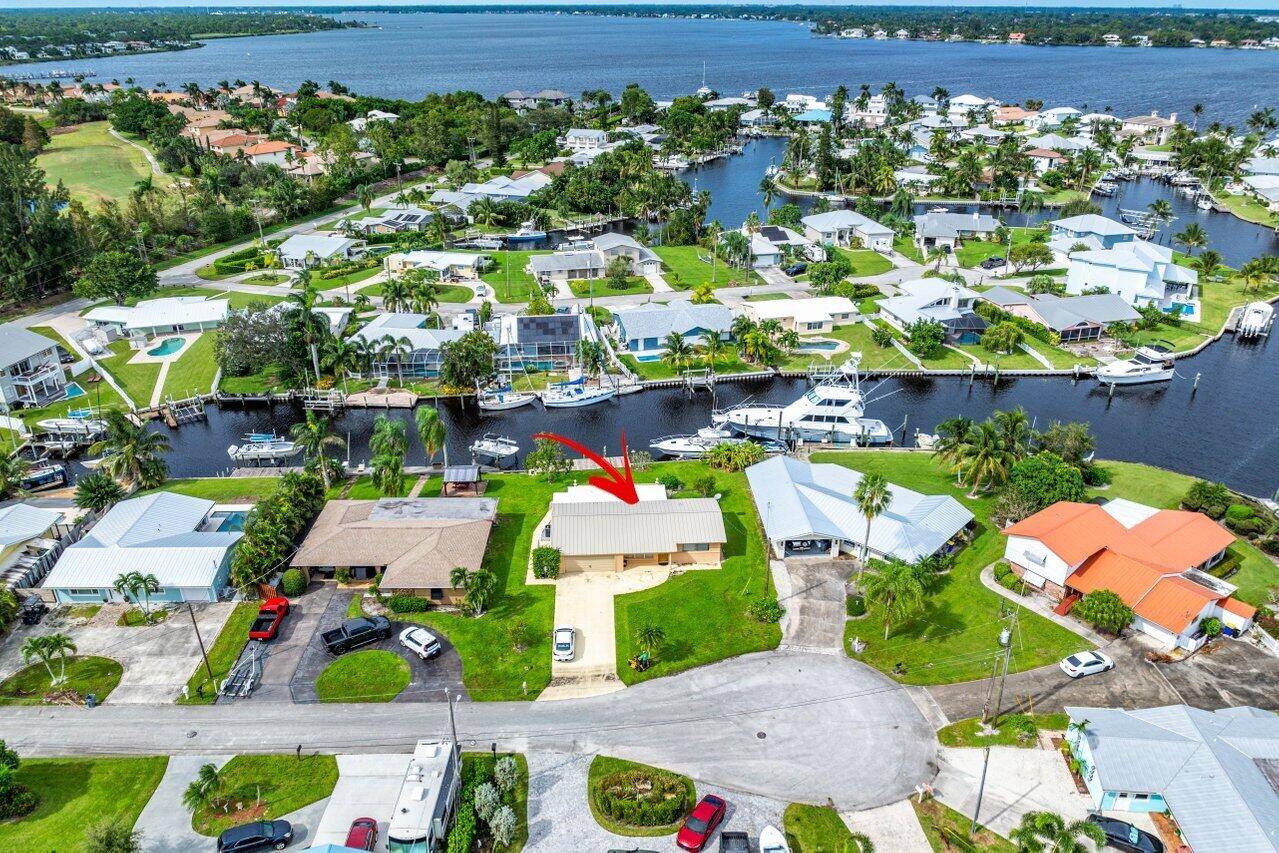 Opportunity Knocks ! ! This 3 bedroom, 2 bath single family home located on a DEEP WATER NO FIXED Bridges waterfront lot !