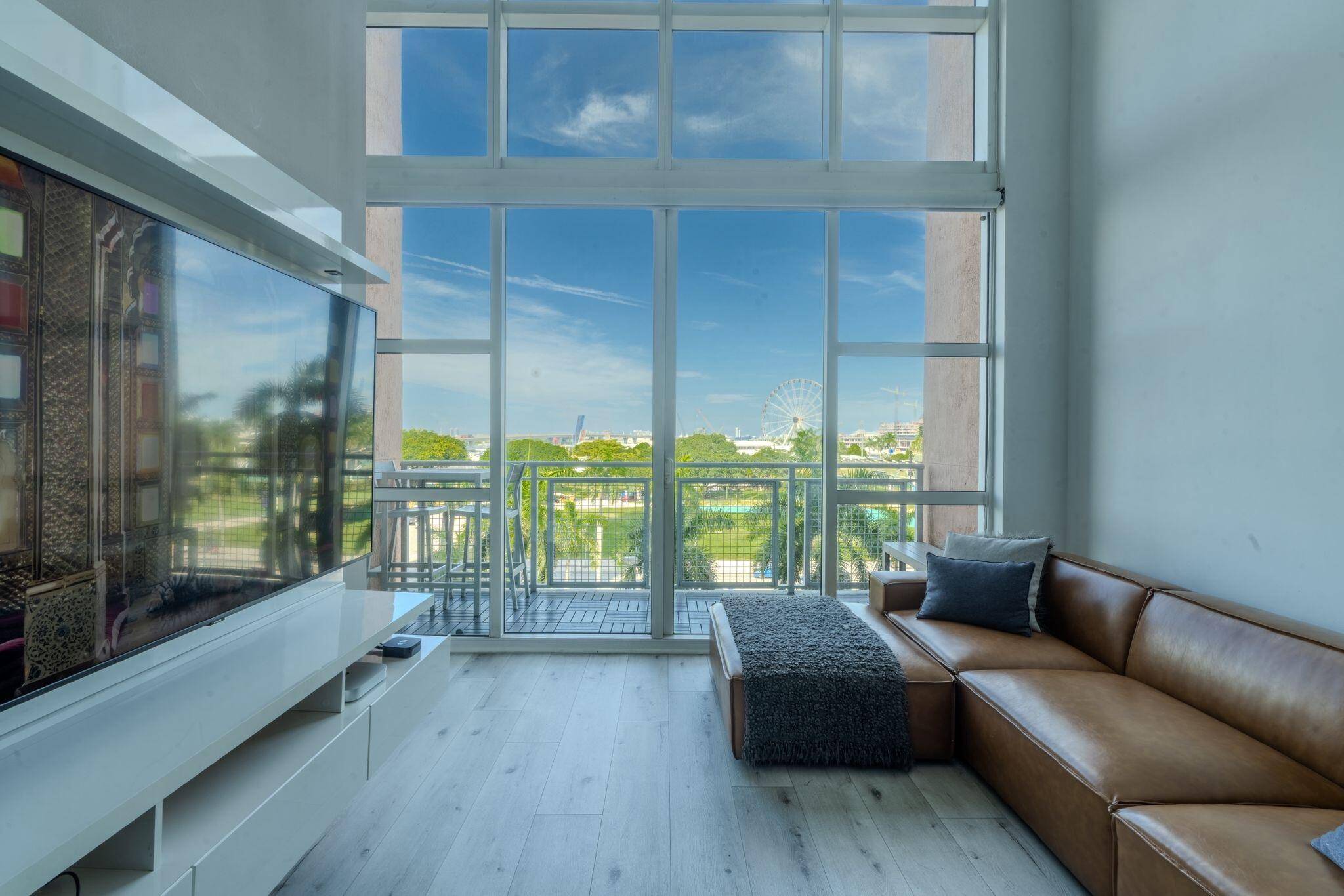 Located in the heart of Downtown Miami, this stylish 2 story loft offers nearly 1, 000 SQFT of open living space, soaring 20 ft hurricane impact windows, and a private ...