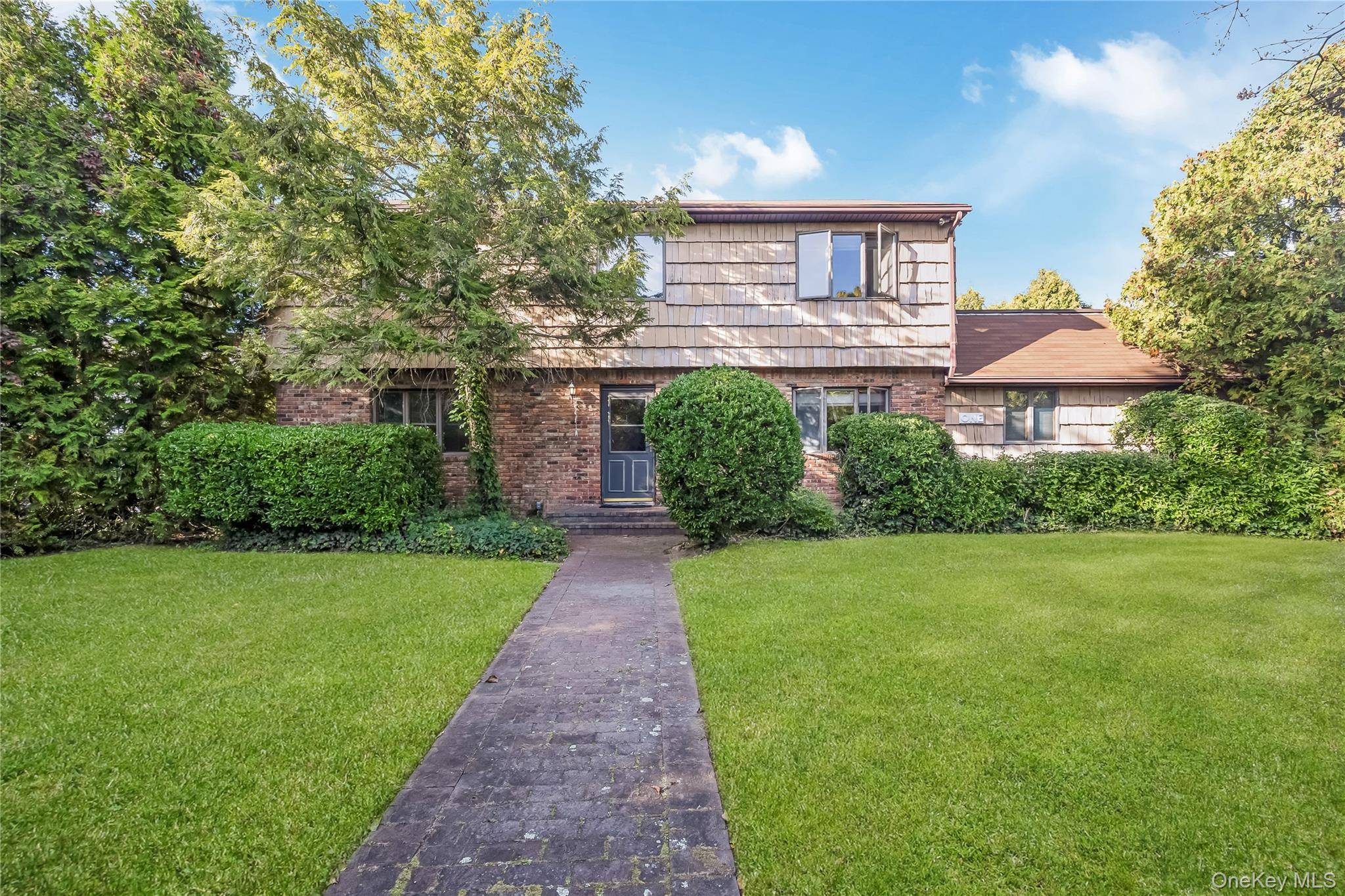 Welcome to this beautifully maintained Colonial featuring 3 bedrooms and 2.