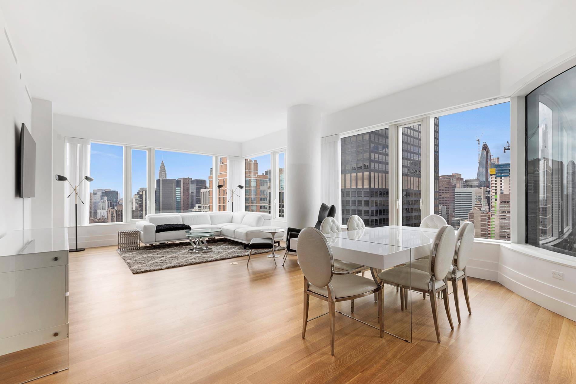 Spacious 1, 736 square foot corner residence with panoramic views of south and west skyline through oversized windows.