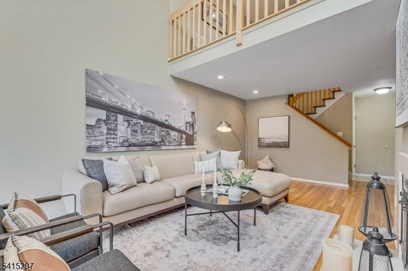Bright, spacious and beautifully updated Muirfield model in the desirable West Essex Highlands community featuring a first floor primary suite.
