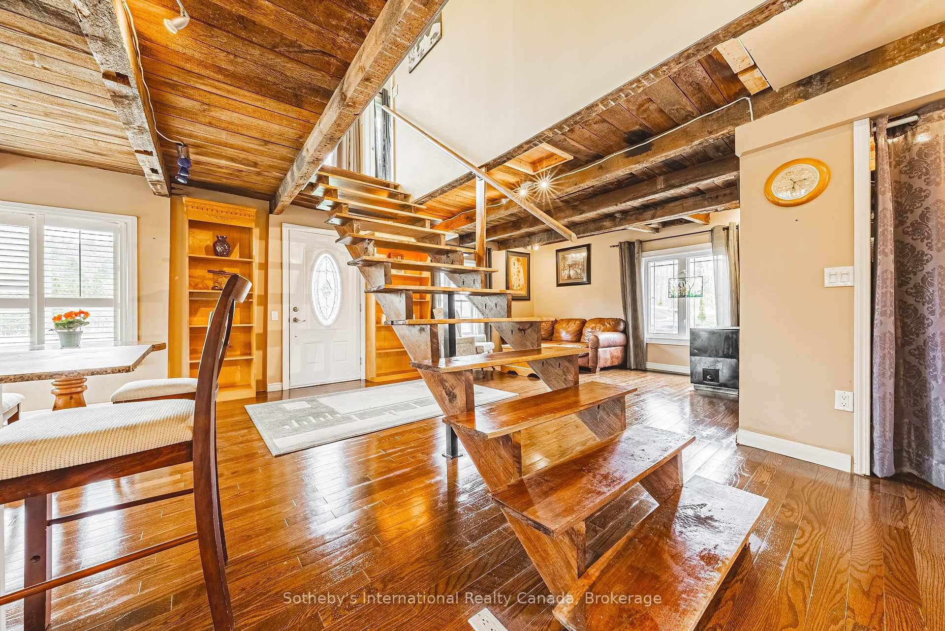 This near one acre property features a beautiful 3 bedroom home and a new heated 2 car garage.