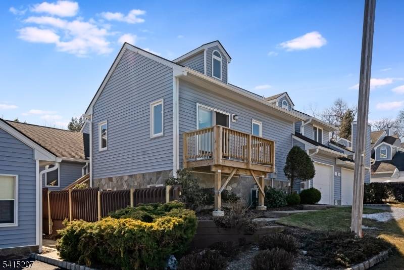 Bright, spacious and beautifully updated Muirfield model in the desirable West Essex Highlands community featuring a first floor primary suite.