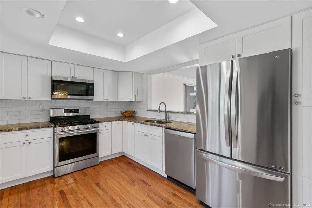 WOW ! This AMAZING remodeled 2 bedroom ranch condo is perfect for anyone looking for easy living complete with a chair lift for added convenience.