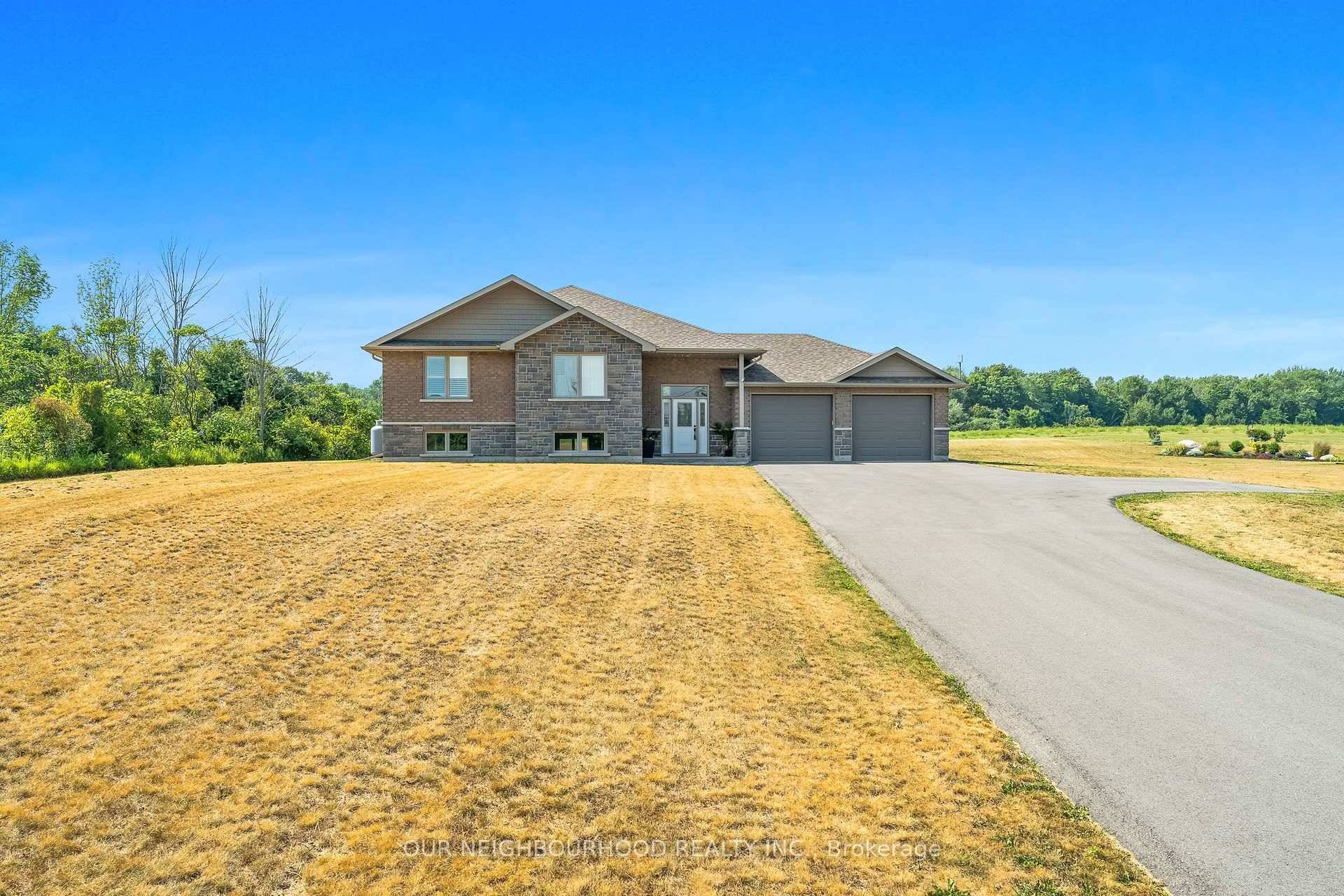 This beautiful raised bungalow, set on a picturesque 1.