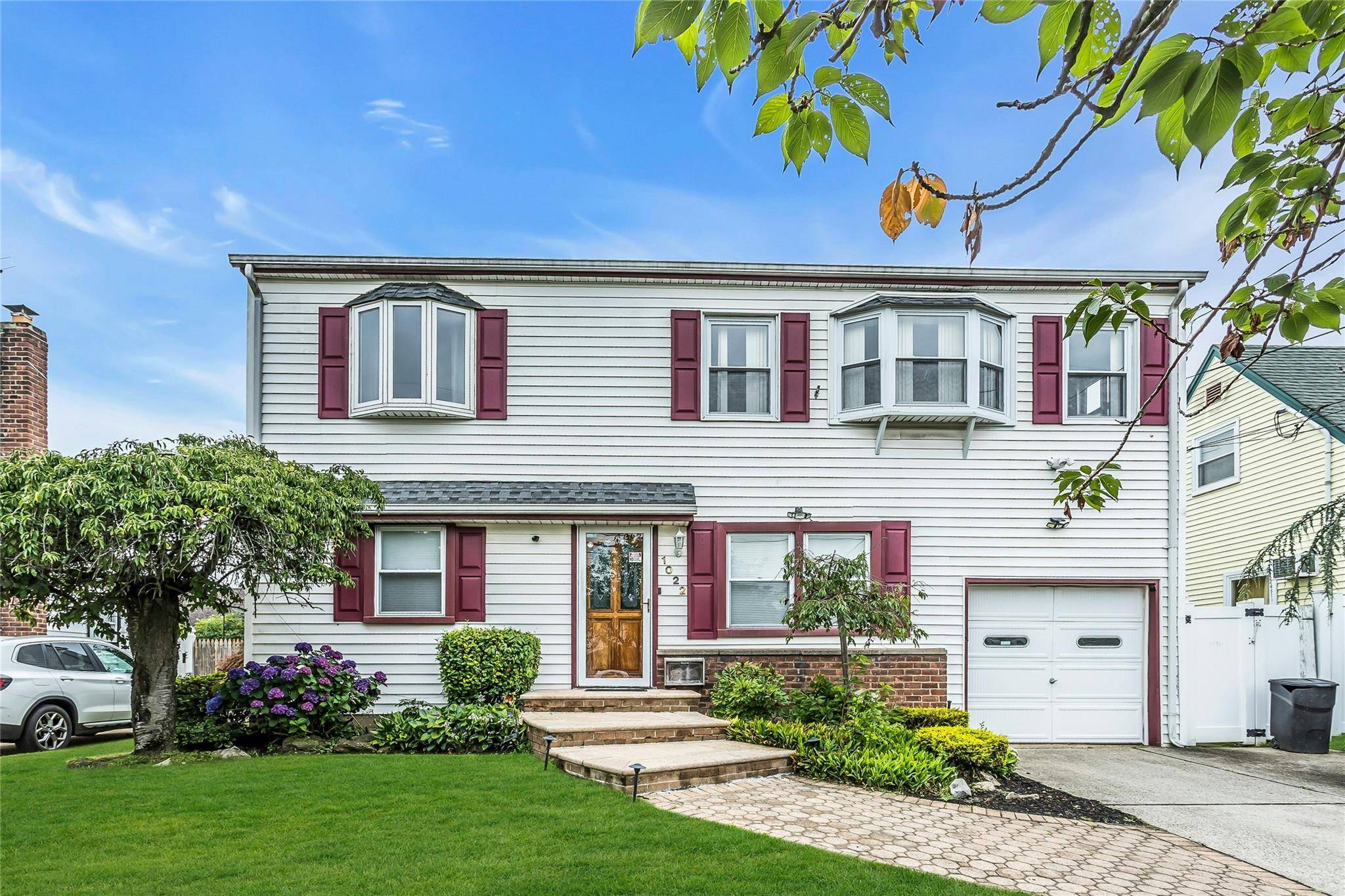 Spacious Bright Expanded Cape in East Meadow Schools.