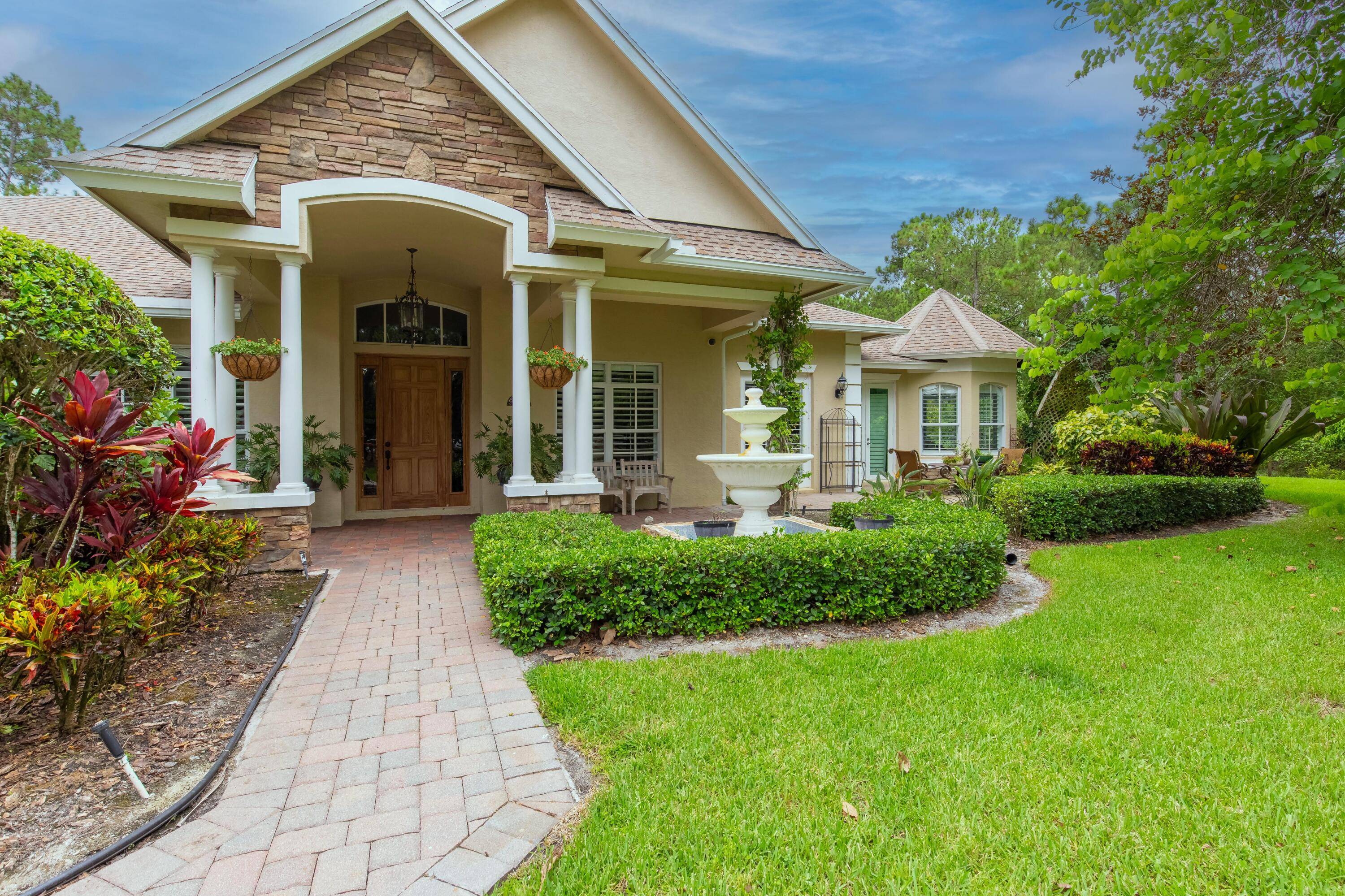 Retreat to this charming estate home situated on 5.