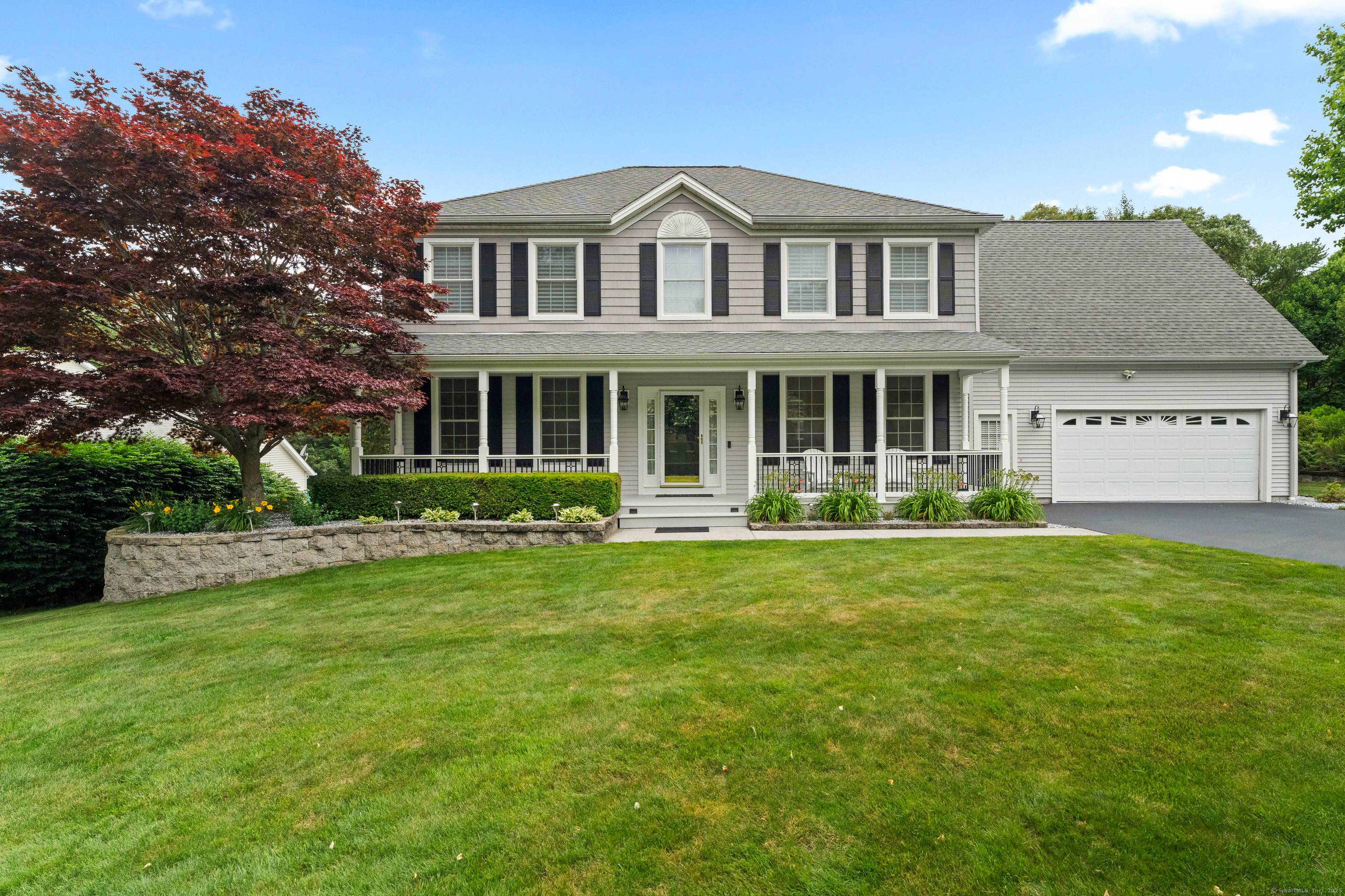 Welcome home to this spectacular colonial located on a quiet cul de sac.