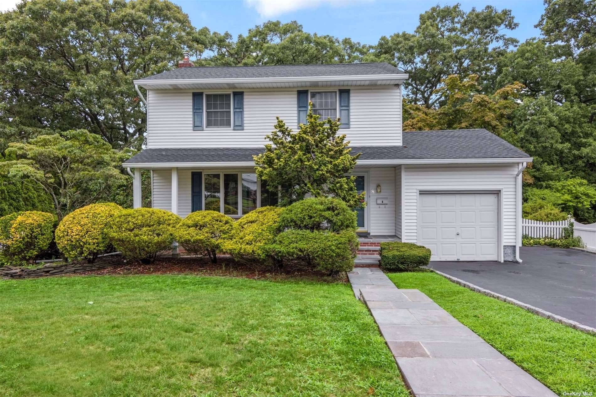 Lovely Colonial in a picturesque, sidewalk lined neighborhood within the Commack School District is ready for you to make it your own.