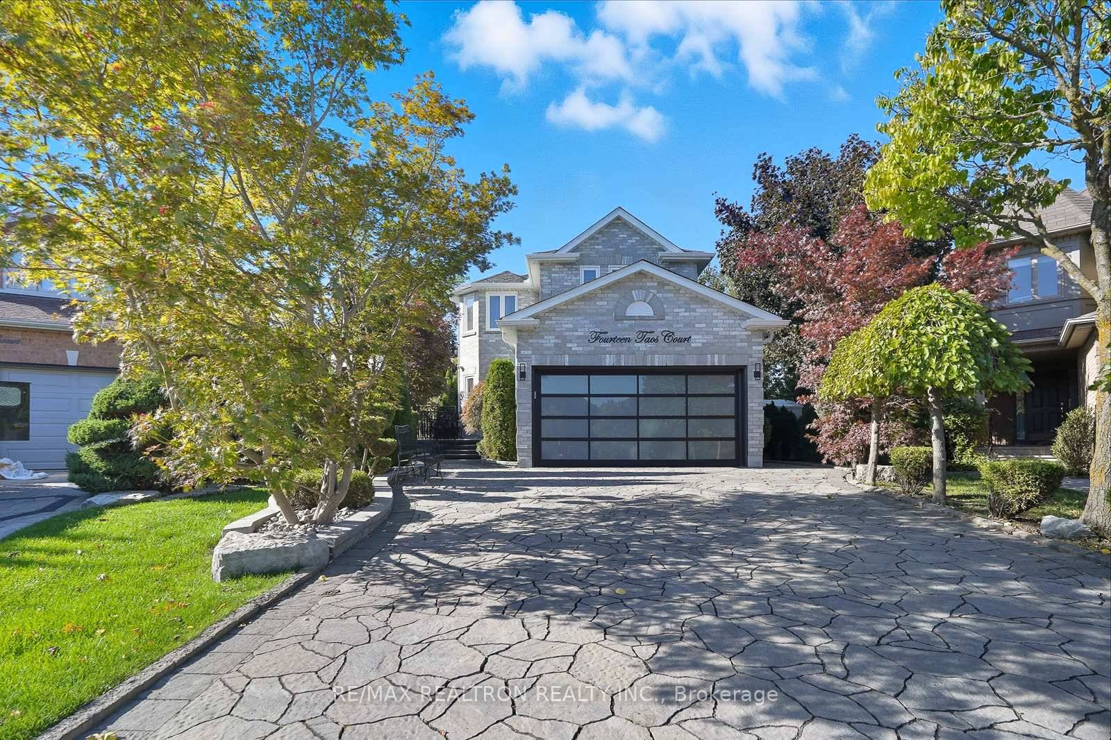 Absolutely immaculate executive home on private court with a huge pie shaped lot backing onto a greenbelt !