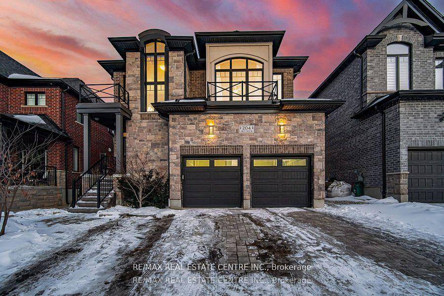 Located in the desirable Doon South neighborhood, this stunning property features a 41' x 135' lot and is built by Kenmore Homes Okanogon model.