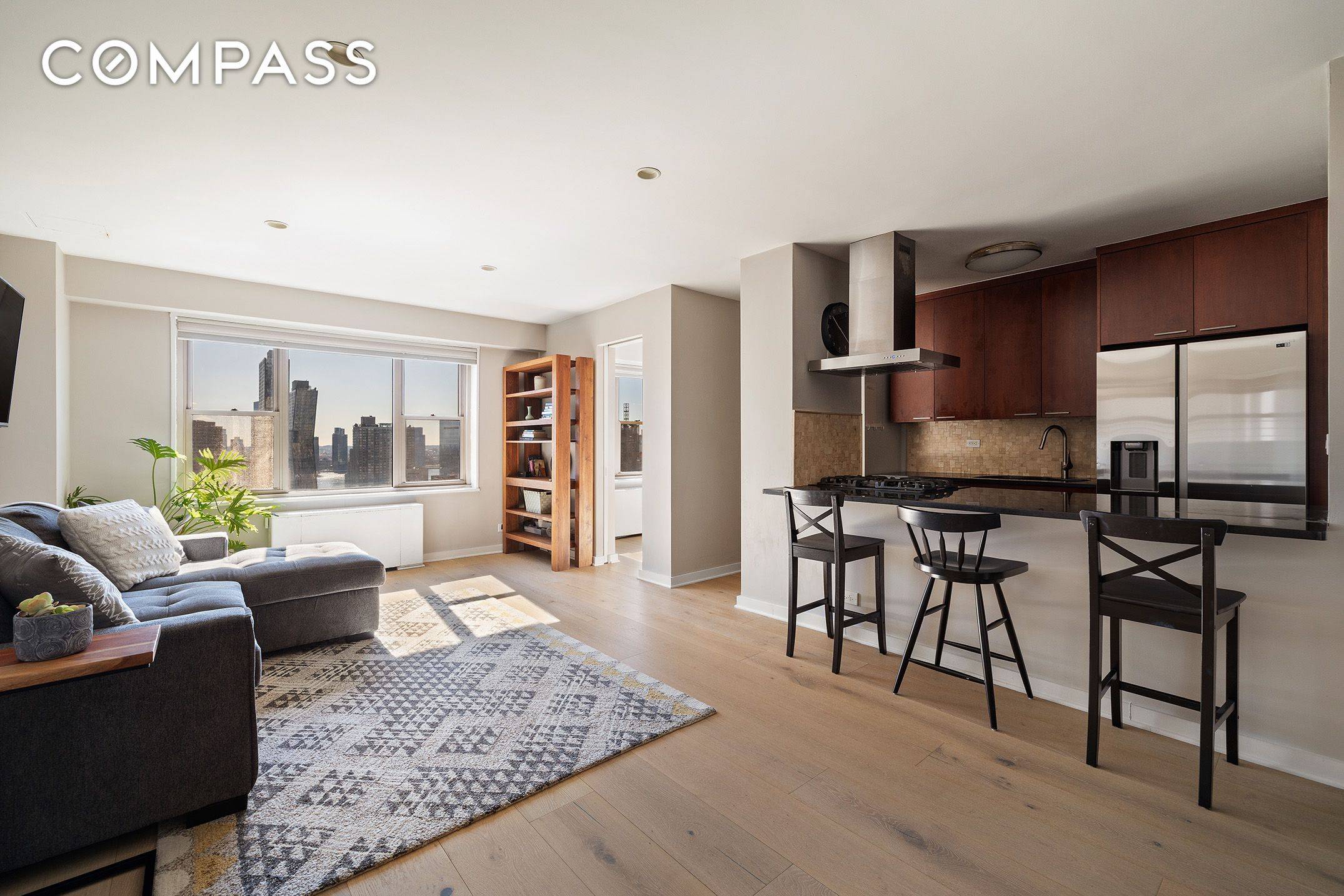 Refined Living with Open Views Perched on the 24th floor, this meticulously renovated residence with sweeping river views combines contemporary design with thoughtful craftsmanship.