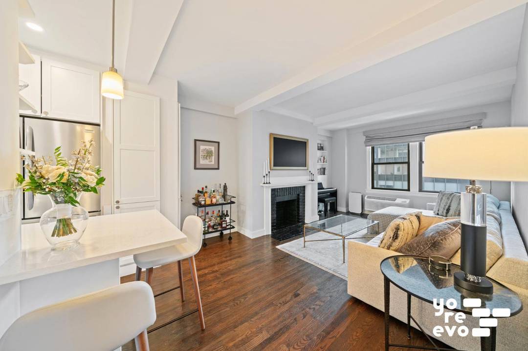 Move right into this renovated south facing two bed, one bath prewar home with a wood burning fireplace on Mitchell Place, a historic block between Sutton Place and the United ...