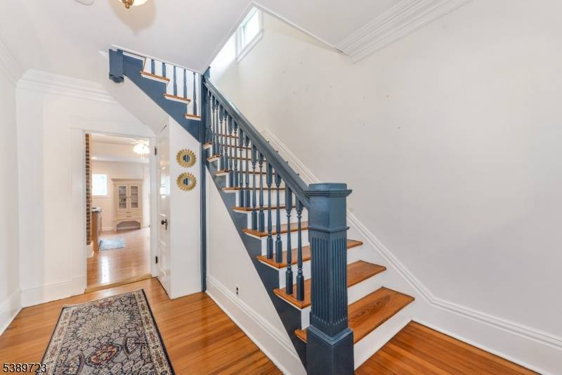 Nestled just a short stroll from historic downtown Bernardsville, this beautifully restored Victorian seamlessly blends timeless character with modern comforts.