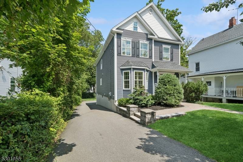 Stunning 2016 Colonial just one block from Town !