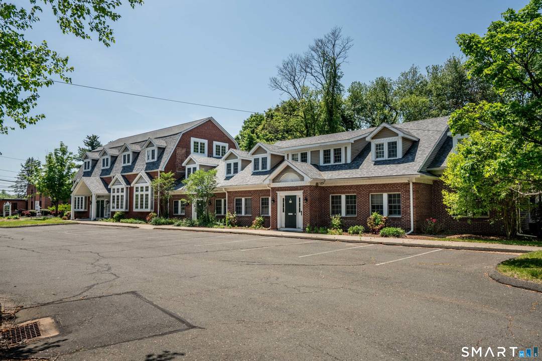 Welcome to 1170 Ellington Rd this architecturally distinctive Gambrel style office building sits on a beautifully landscaped site in an established South Windsor corridor !