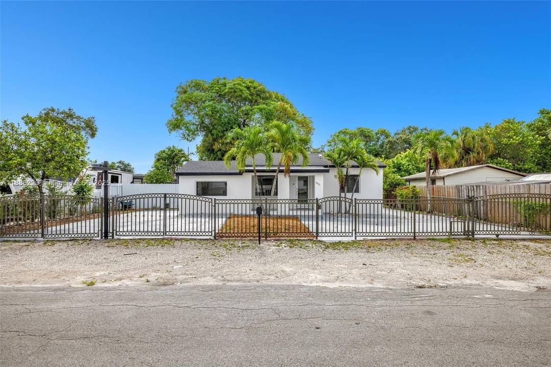 Fully renovated single family home with new impact windows, roof, pluming, and electrical.
