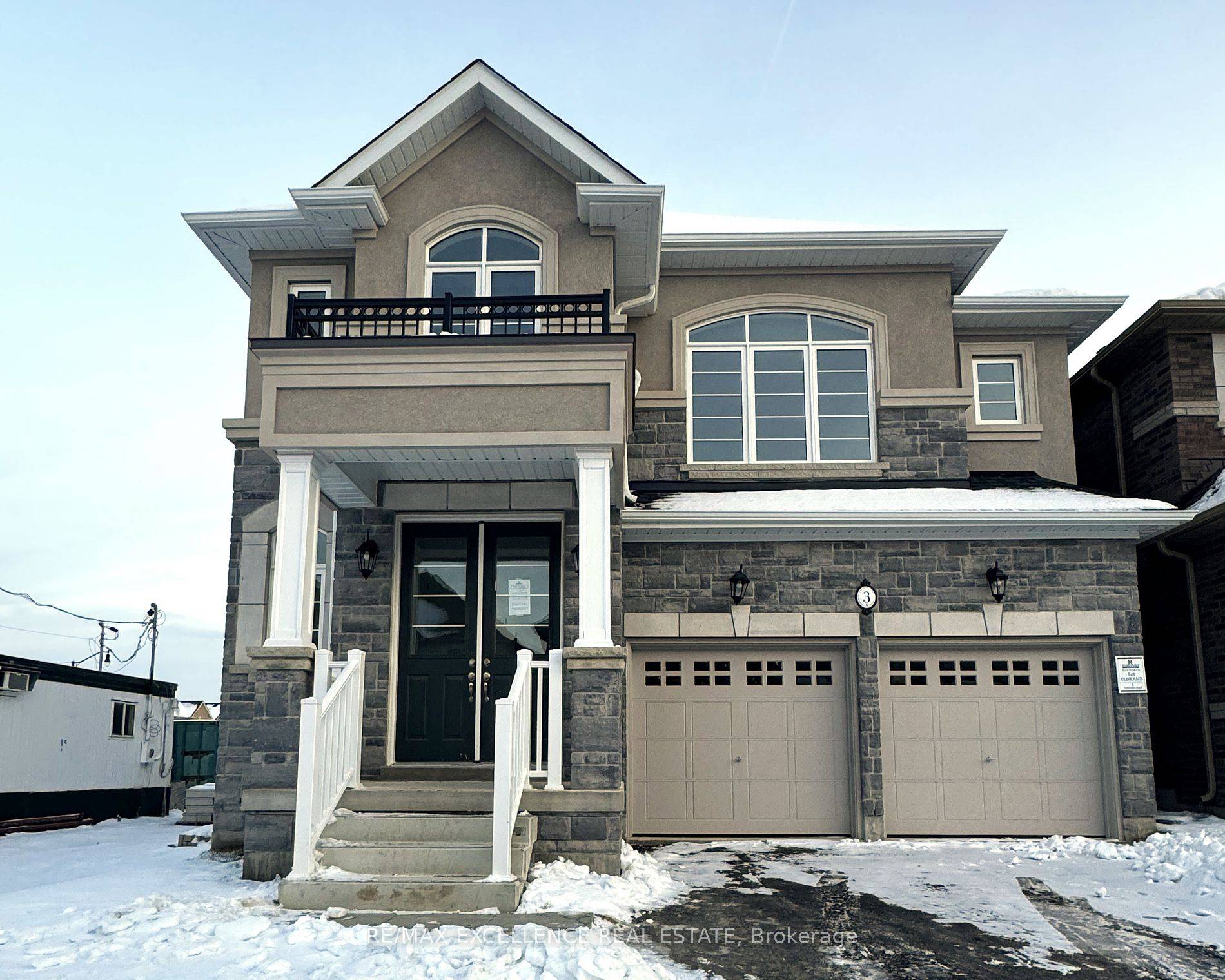 This is a stunning property featuring a stone and stucco exterior.