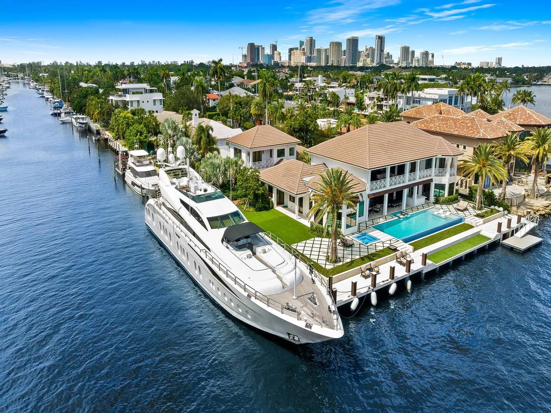 Live the true South Florida Lifestyle on this island's gated West Indies Oasis !