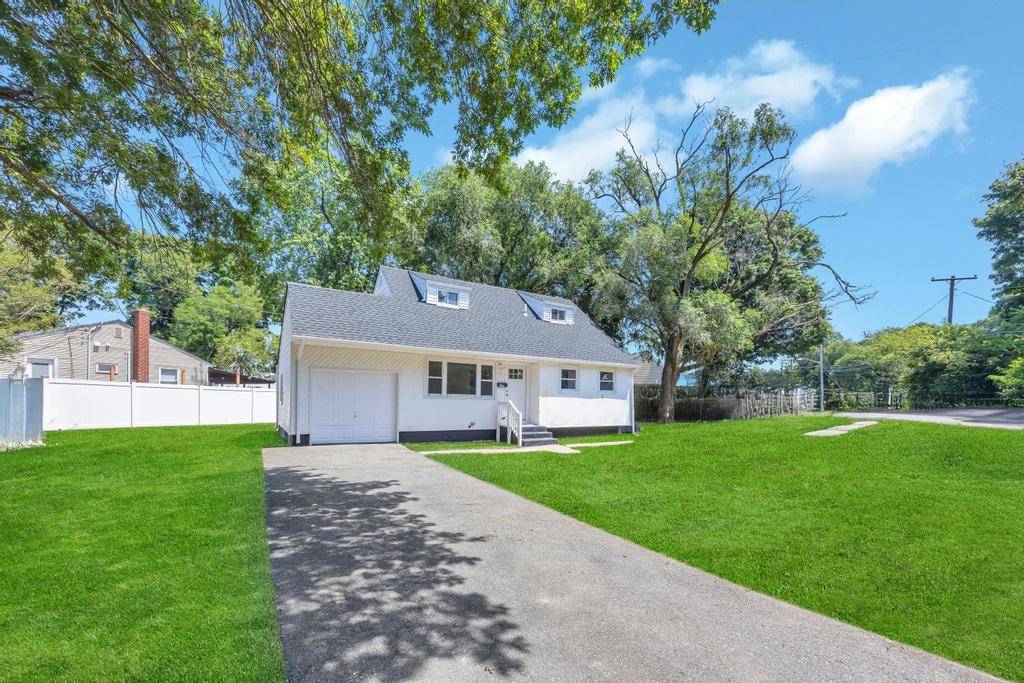 Charming Cape COD in Brentwood, Newly Renovated Cape that blends space, comfort, and practicality.