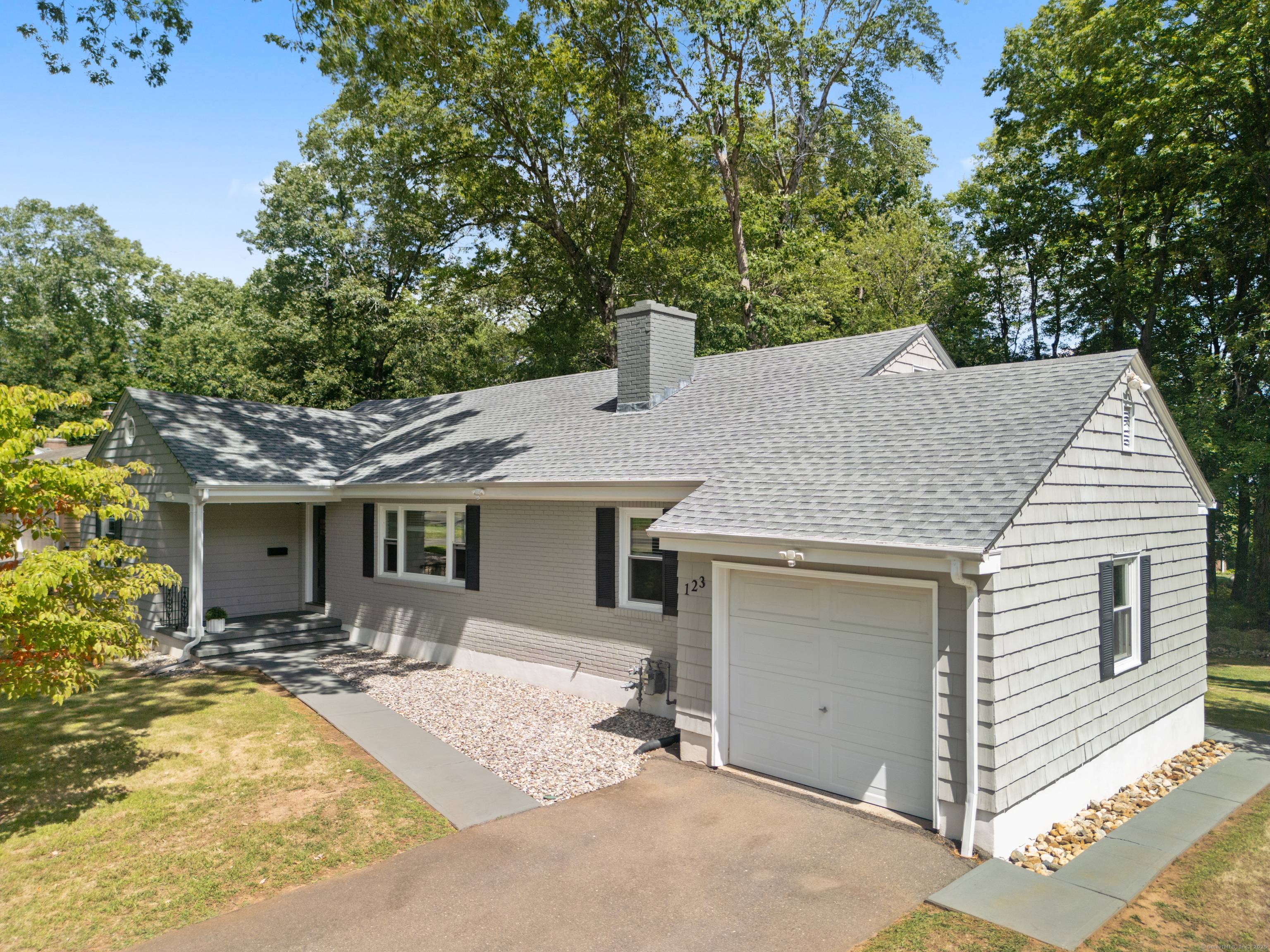 Welcome to 123 Hickory Hill Road, an elegant turn key residence nestled in one of New Britain's most desirable neighborhoods.
