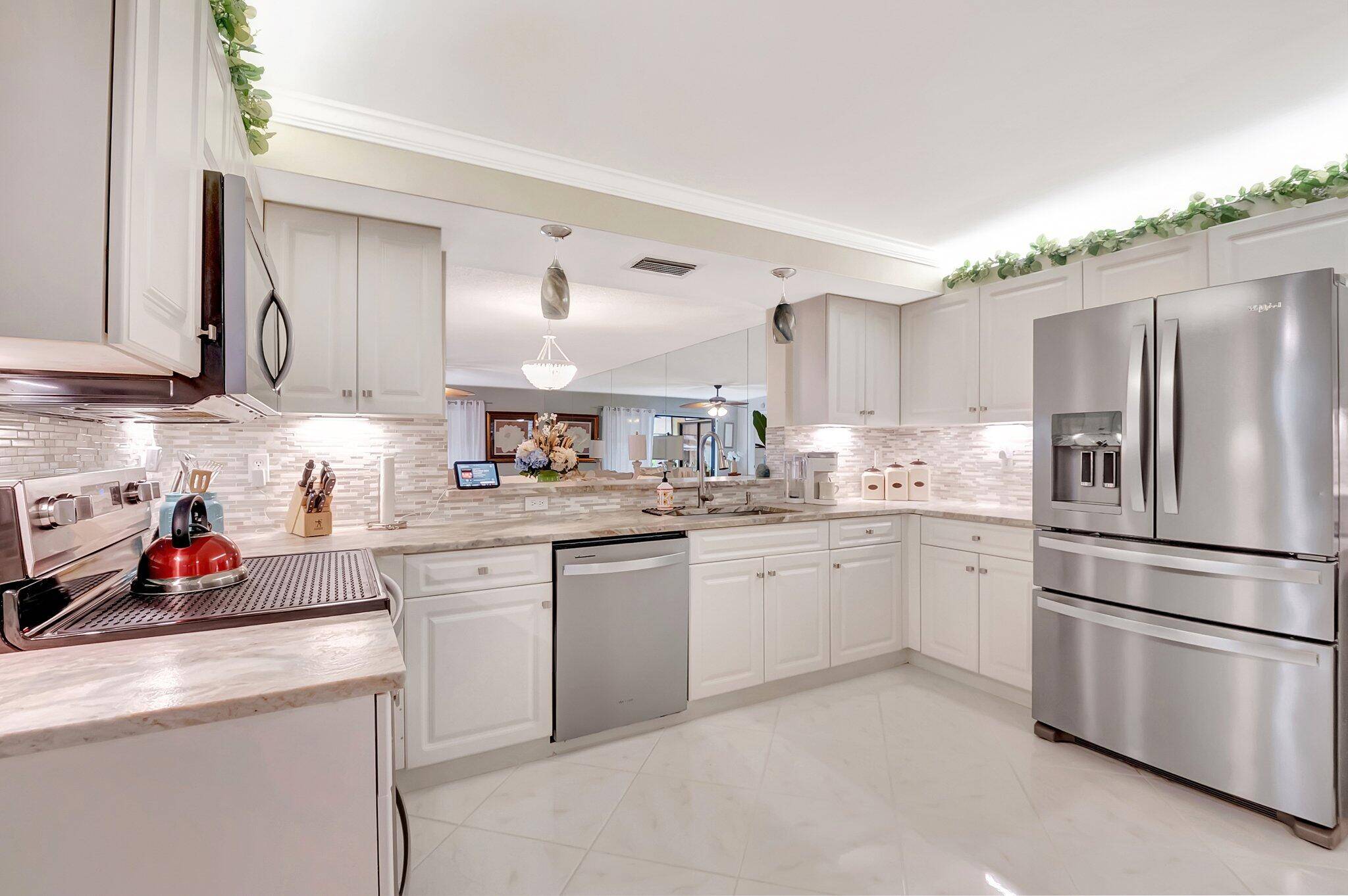 Step into this Cozy, Warm, and Enchanting 2 2 Condo Where Spacious, Light Filled Living Spaces Meet Modern Elegance Designed for Comfort Entertainment This Home Offers an Updated Chef's Kitchen ...