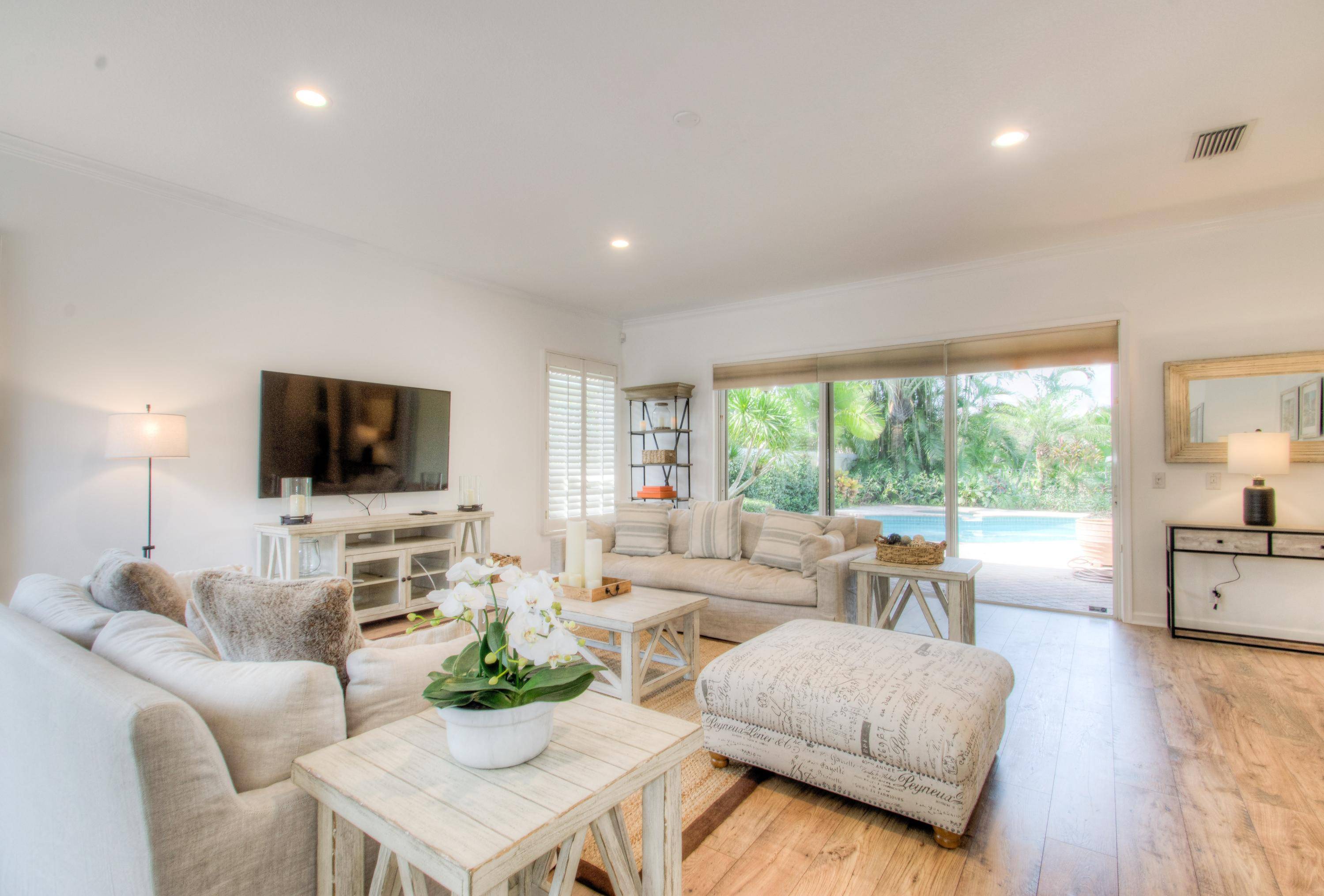 his courtyard style villa has been recently renovated with new wood flooring and new kitchen countertops.