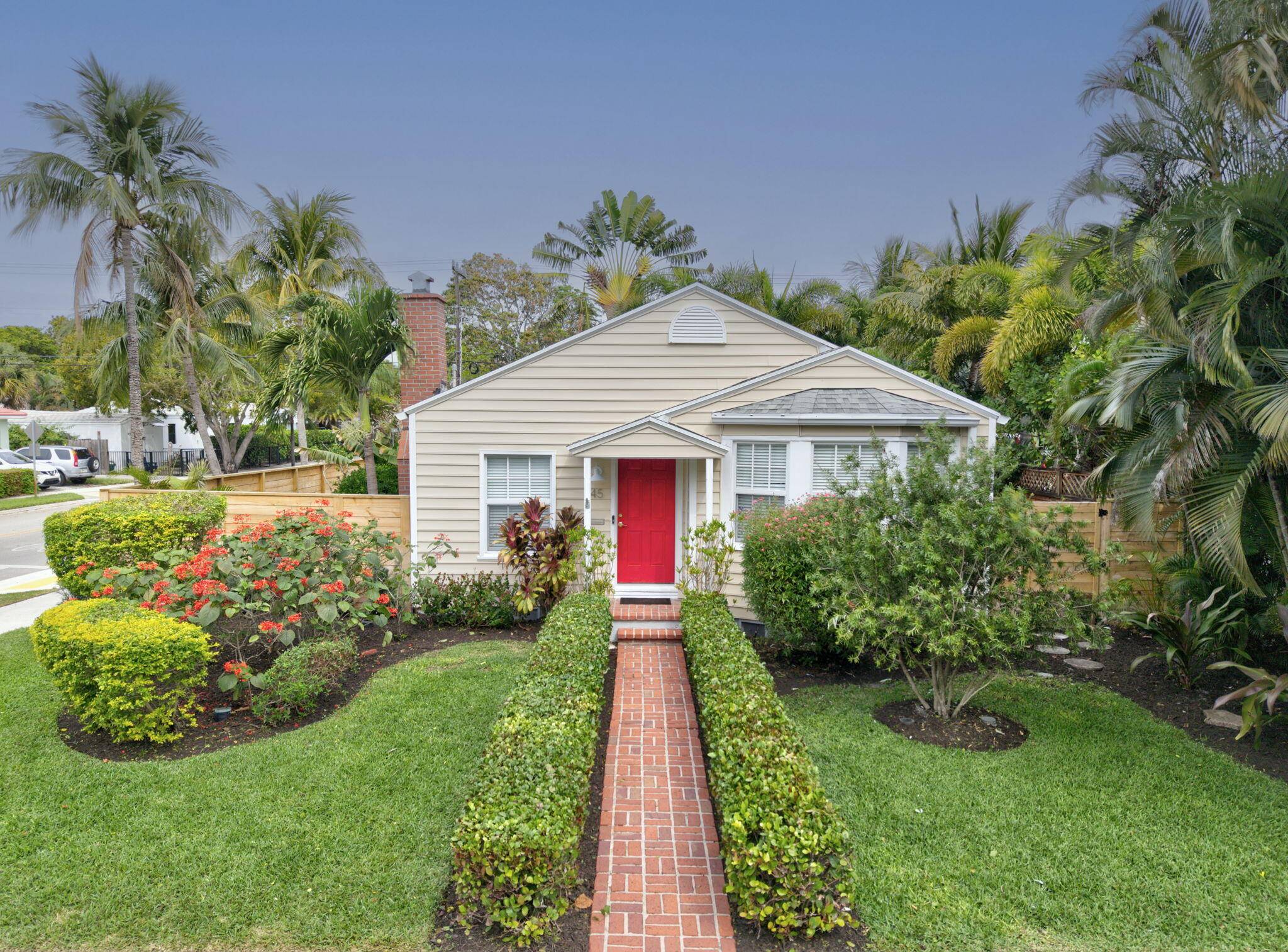PRICE REDUCED ! This charming property includes a 2Br 2Ba main house, a rental guest cottage, one car garage, plus an outdoor entertainment covered wet bar area.