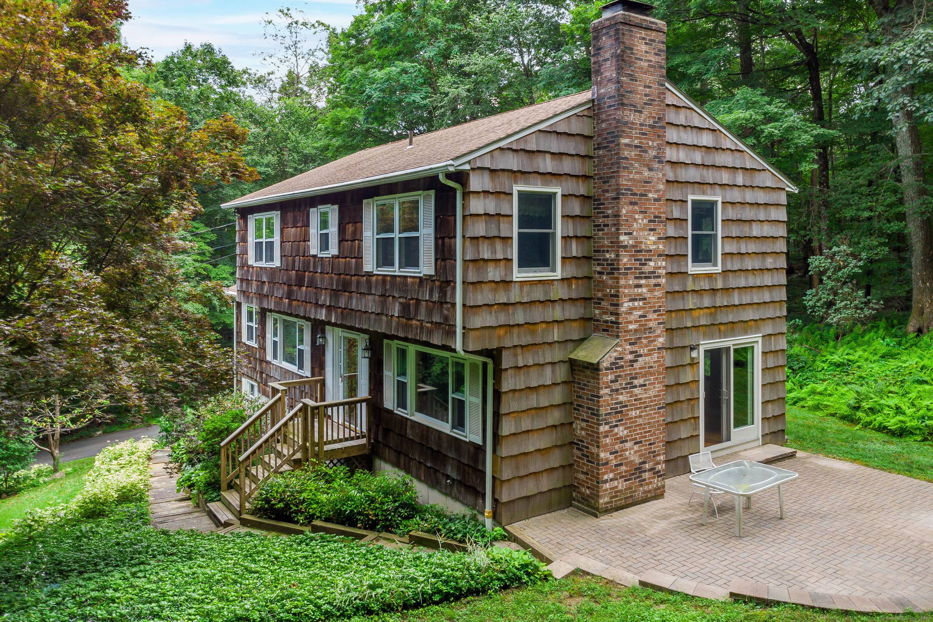 Welcome to 159 Route 37 in beautiful New Fairfield, CT a comfortable, private, and well maintained 4 bedroom, 2.