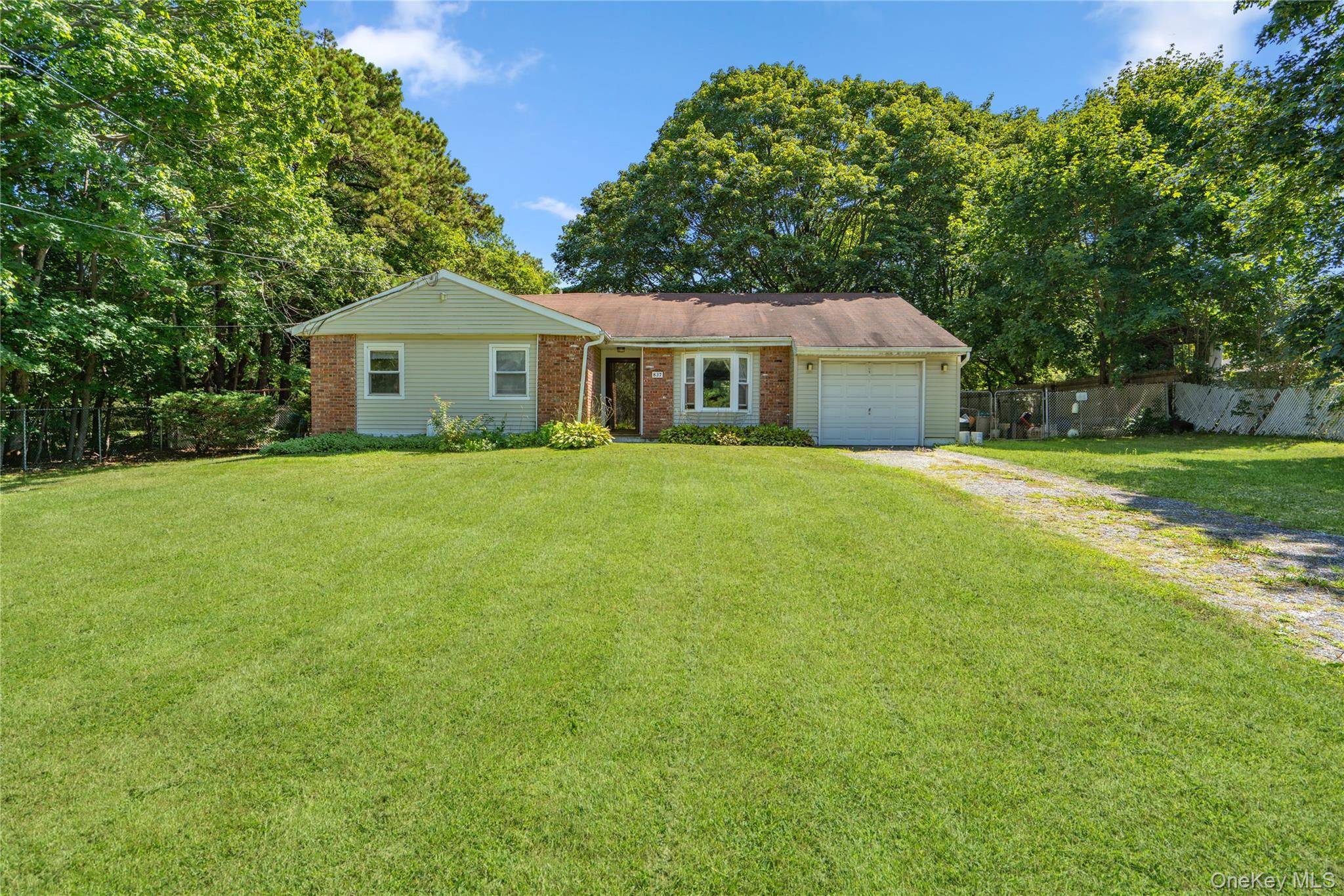 Welcome to this inviting 3 bedroom, 2 bathroom ranch style home, nestled on a generous 0.