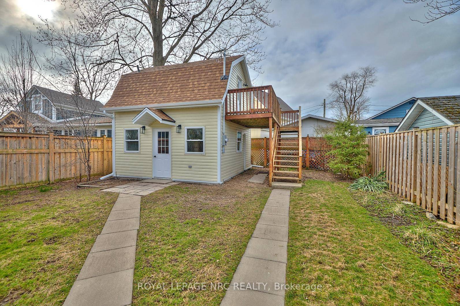 BEAUTIFULLY DESIGNED AND METICULOUSLY UPDATED DETACHED ONE BEDROOM HOME IN THE HEART OF DESIRABLE CRYSTAL BEACH.